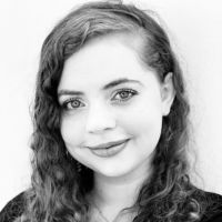 Professional headshot of Laura Dijoux