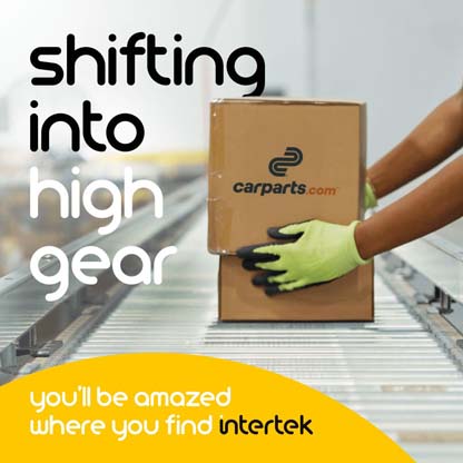 A box with the carparts.com logo being placed onto a conveyor belt